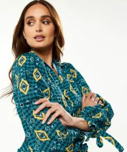 Liquorish African print midi dress with 3/4 length sleeve & tiered skirt detail in green, yellow & navy - Multicolour -Liquorish Sales Store 155cfabb7bbc4f2f849cc1cfa9f2cdc2 scaled