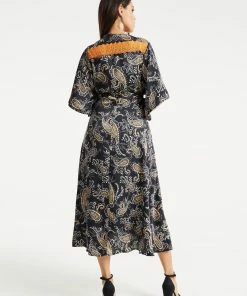 Liquorish Black Based Floral Print Maxi Wrap Dress with Orange Lace Details -Liquorish Sales Store 2f2f6bcb7b4841cb8271430a1350fca8 scaled