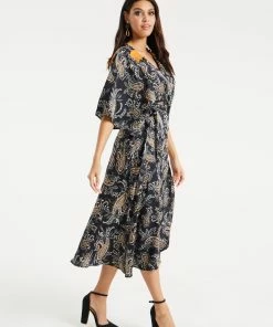 Liquorish Black Based Floral Print Maxi Wrap Dress with Orange Lace Details -Liquorish Sales Store 3ca52dcf4de0416aba2ee2d5948181b0 scaled