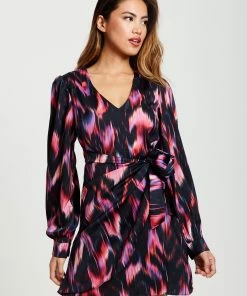 Liquorish Abstract Ikat Print Mini Wrap Dress in Black and Pink