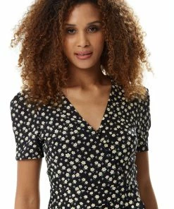 Liquorish Floral Mini Wrap Dress in Black -Liquorish Sales Store 9ab0d548194046058a565cde52e88a11 scaled