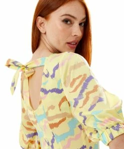 Liquorish Abstract Zebra Print Mini Dress with a Back Tie up in Yellow -Liquorish Sales Store e30eda4cb6db474f82df4fea675811a0 scaled